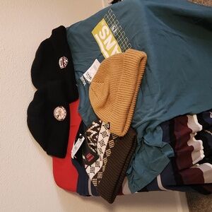 Vans lot of beanies, shirts, and banner